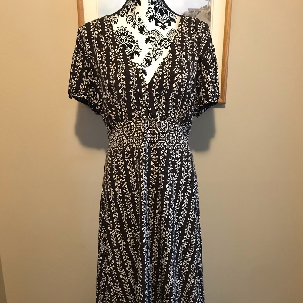 black and white faux wrap dress with tie back.
